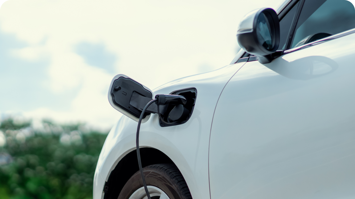 A close up image of an EV being charged