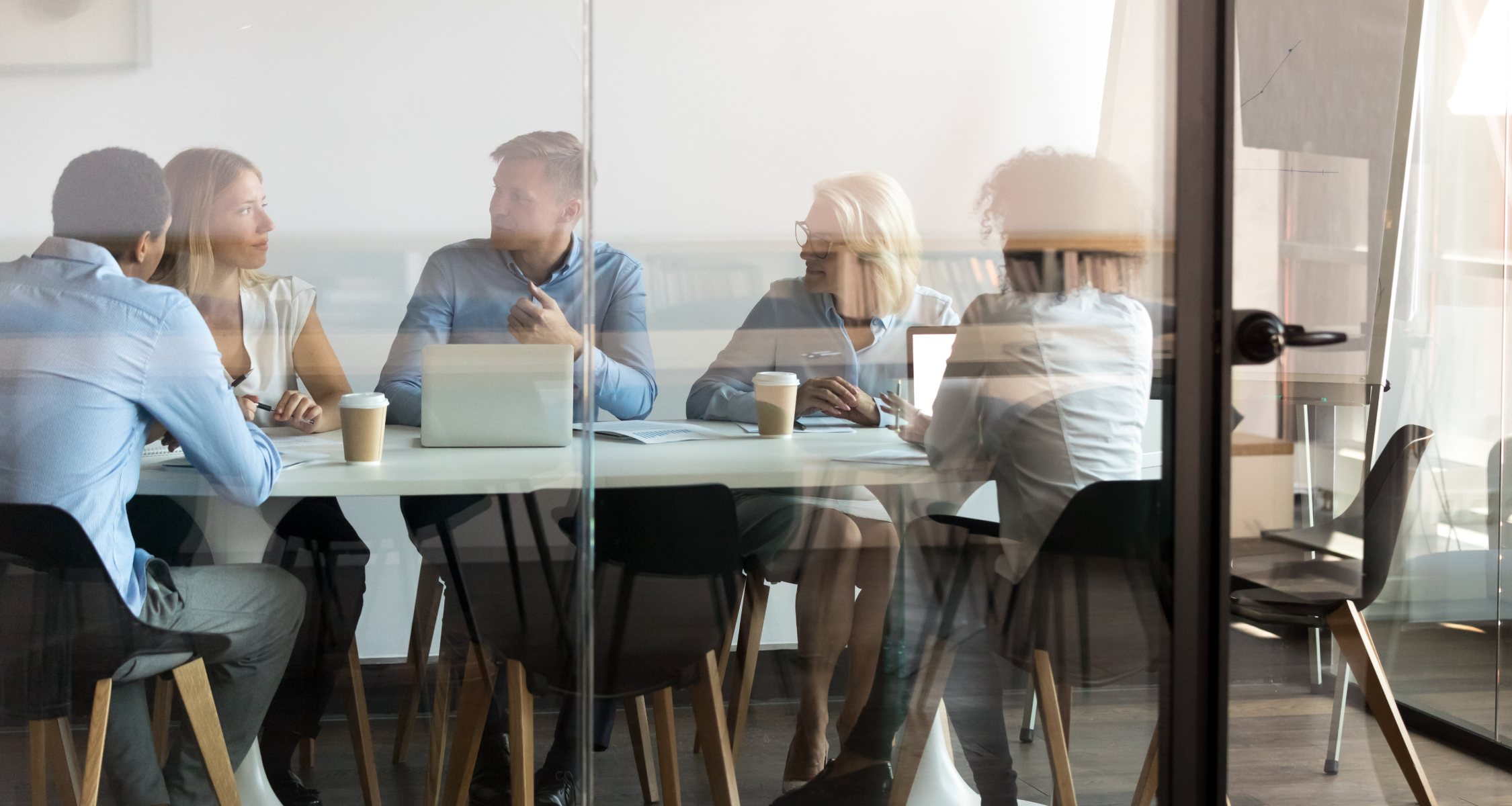 background image of an office meeting