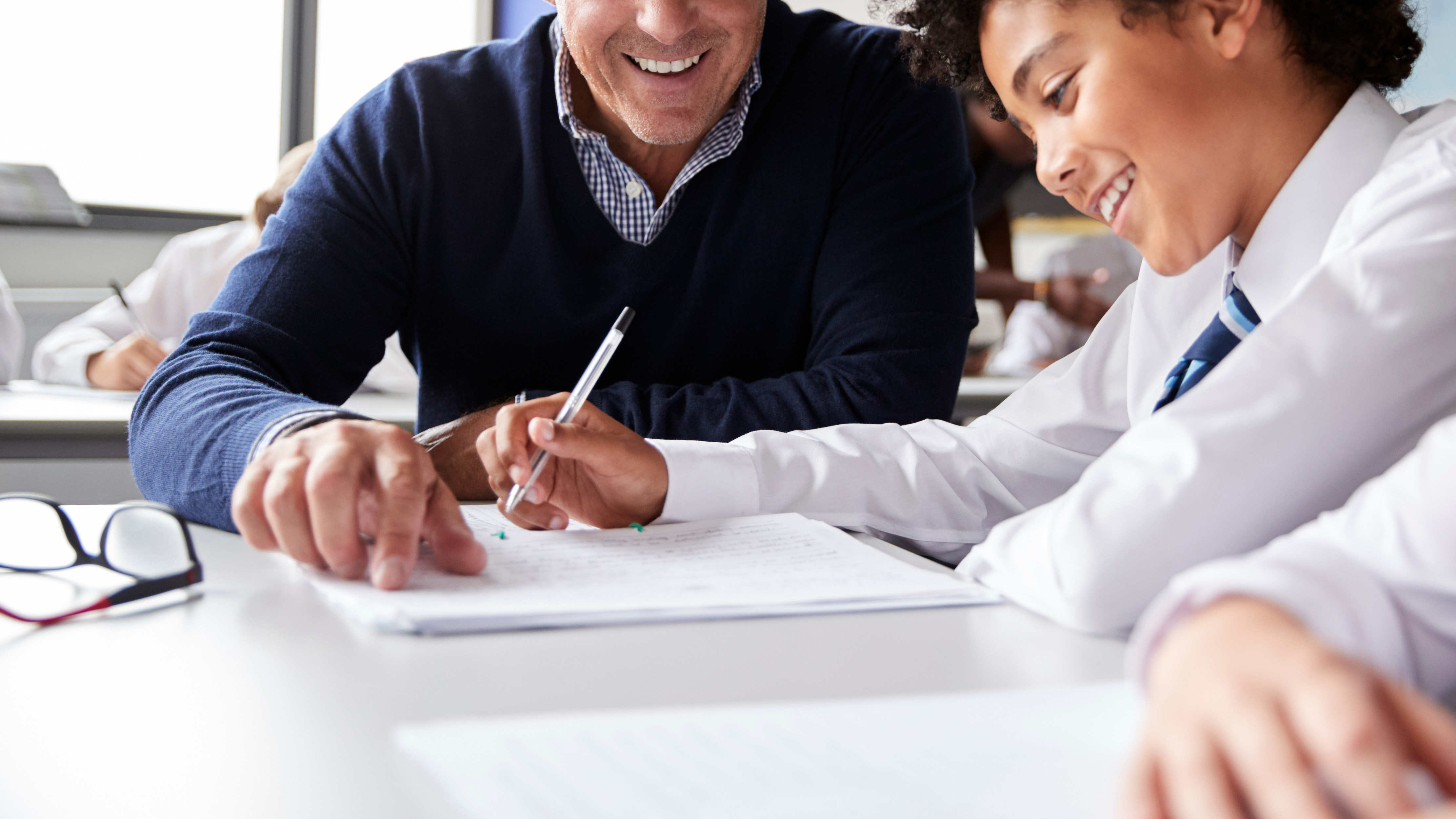 Teacher instructing children
