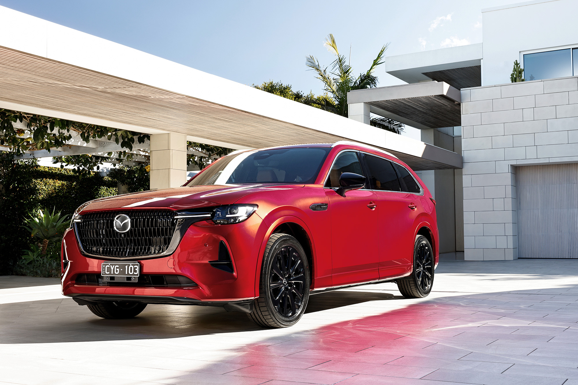 Mazda CX-80 3/4 view in red