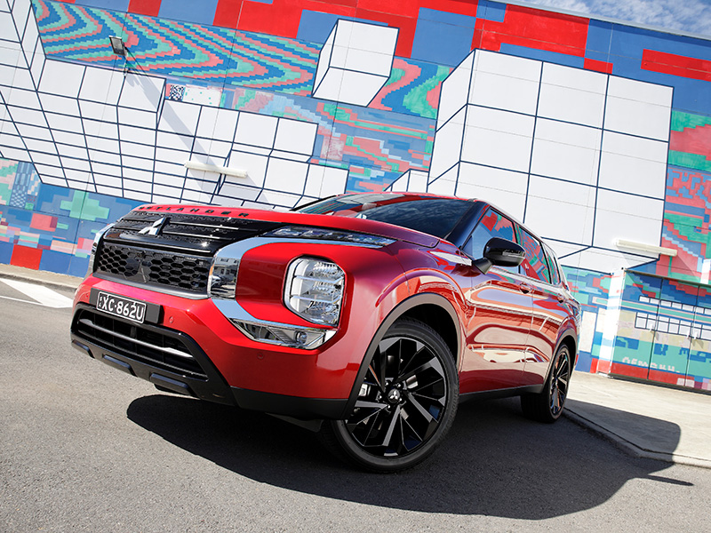 Red Mitsubishi Outlander Plug-in Hybrid Vehicle (PHEV)