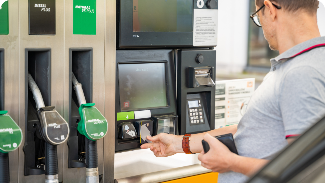 A man paying for petrol at the petrol station