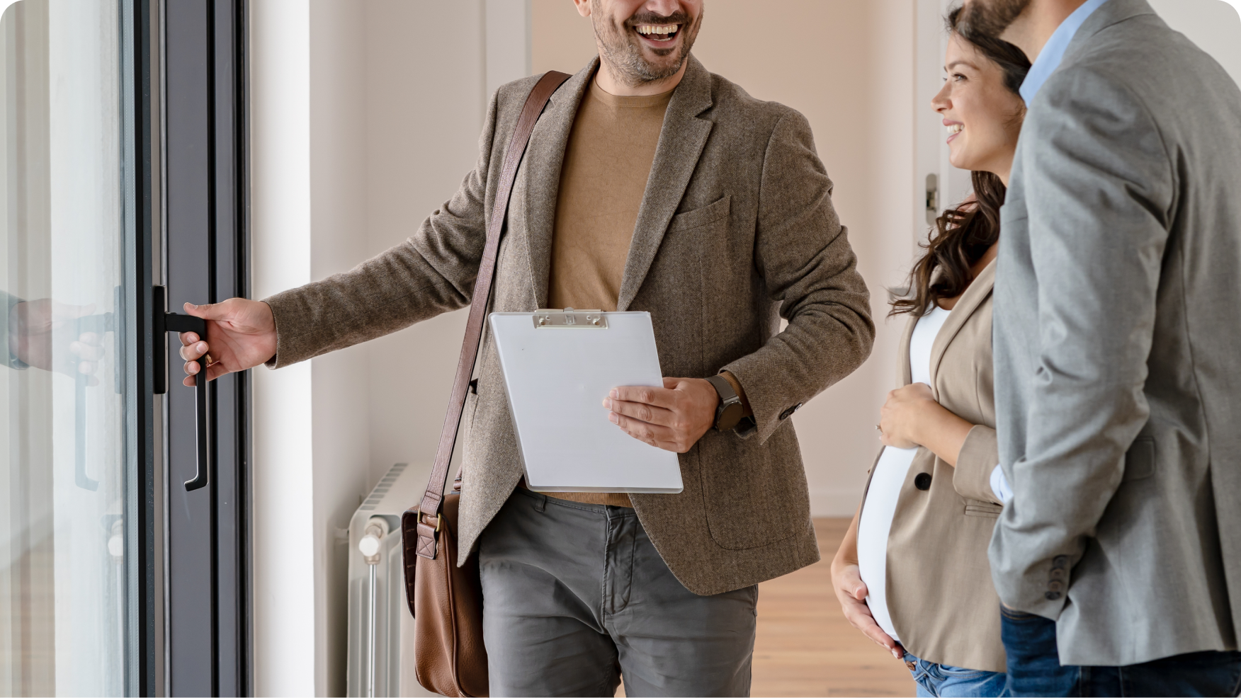 A mortgage broker with a pregnant couple