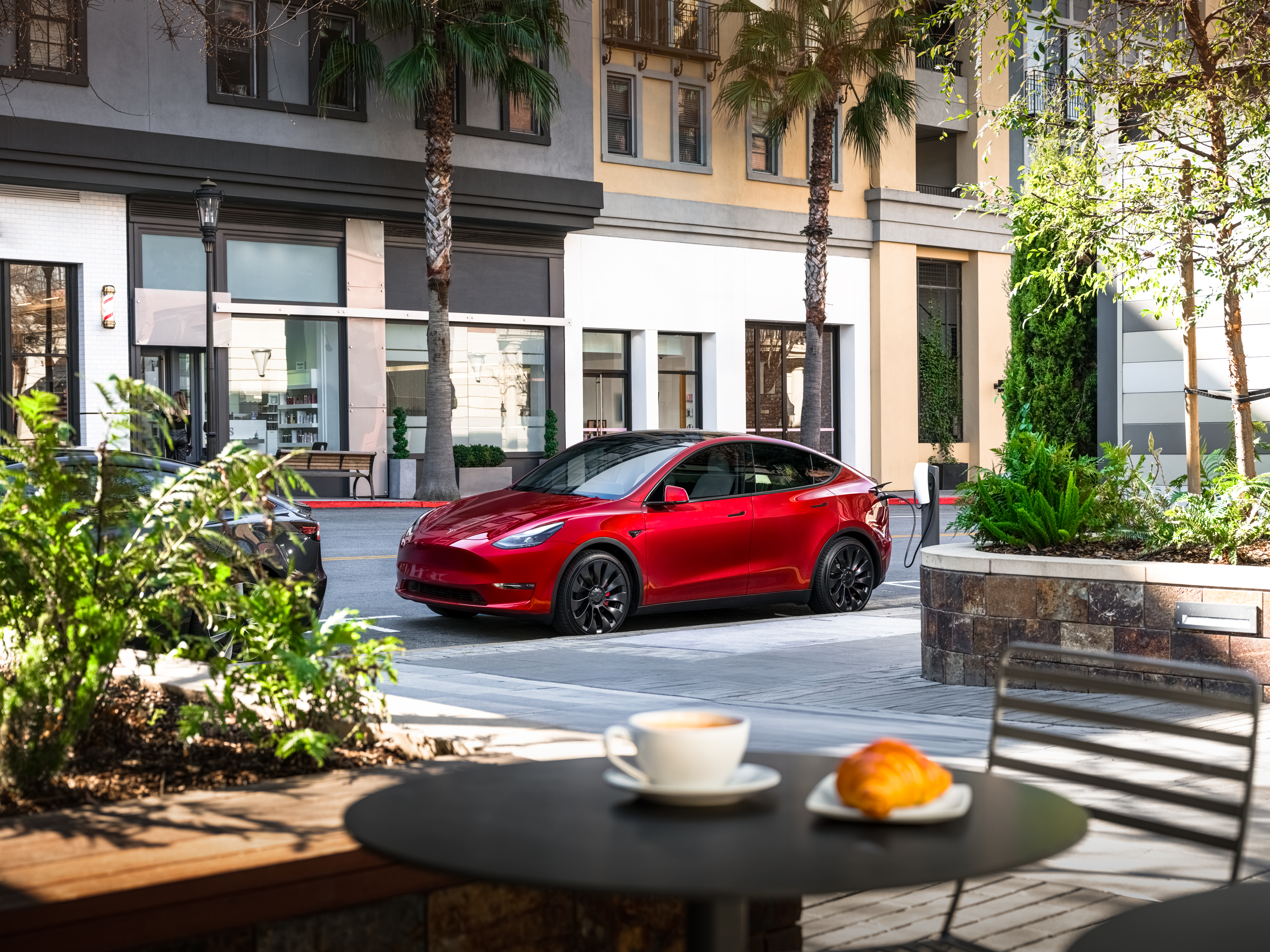 Tesla Model Y charging on the street